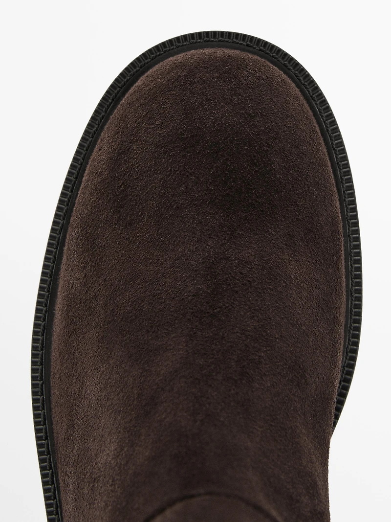 Bottes hautes en croûte de cuir