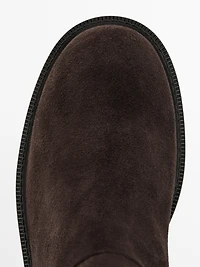 Bottes hautes en croûte de cuir