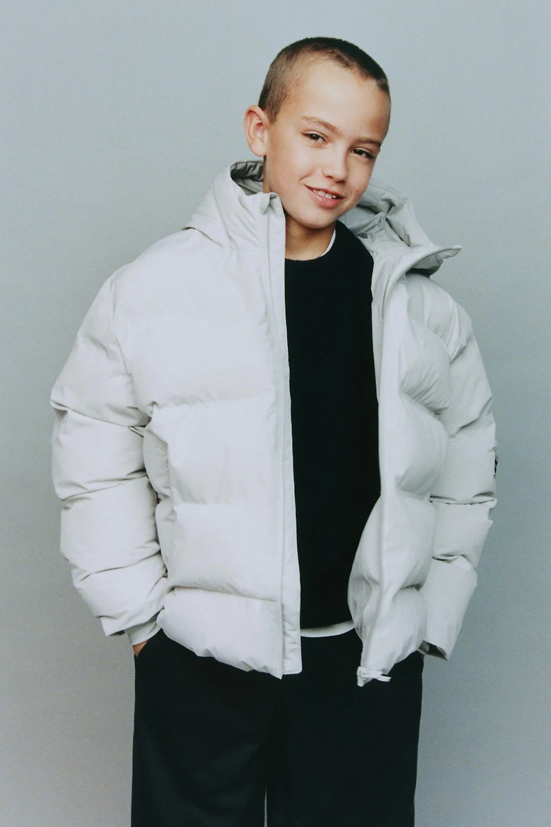 WATER REPELLENT PUFFER COAT WITH LABEL