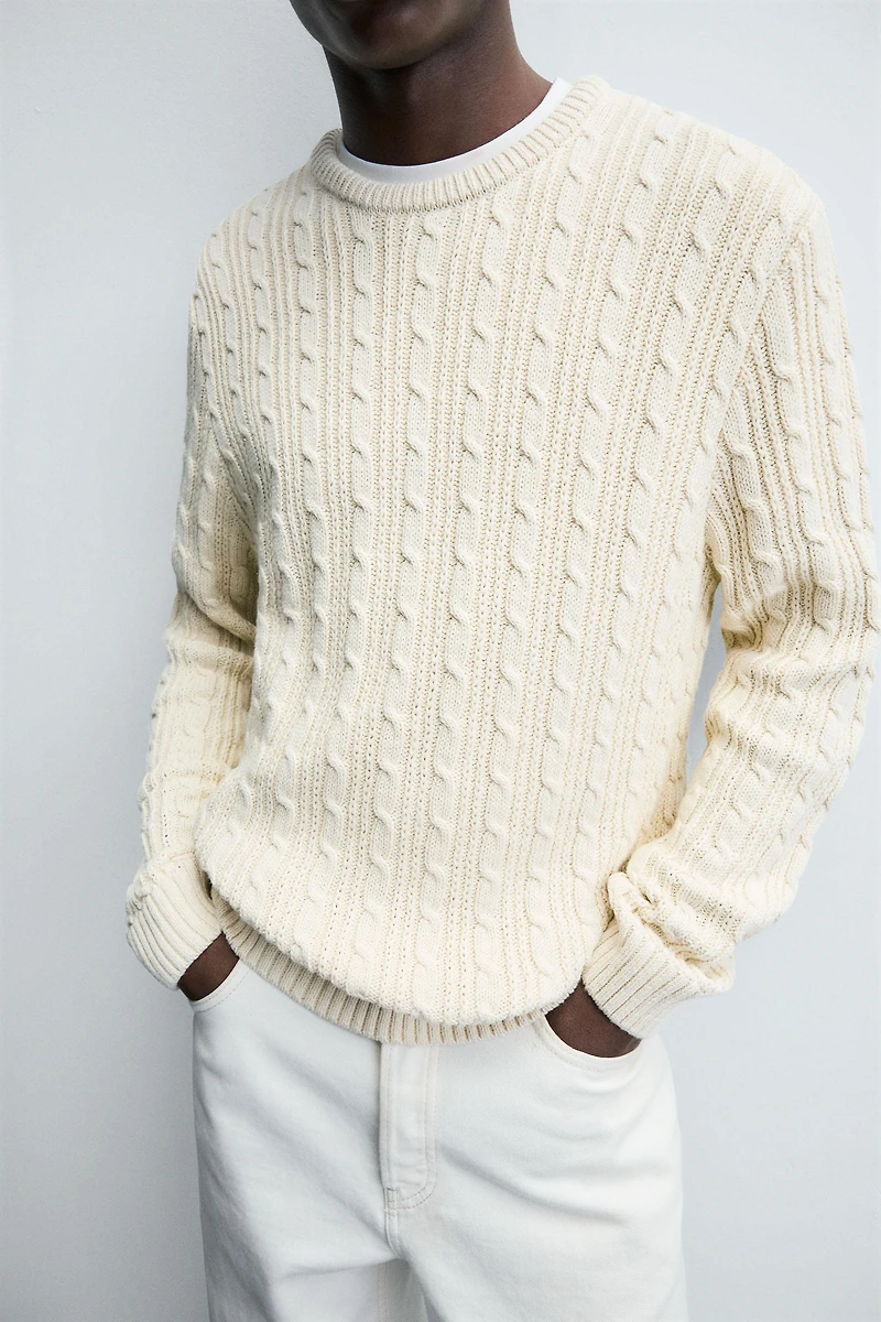 TEXTURED WOVEN SWEATER