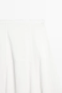 Flowing midi skirt with panel detail