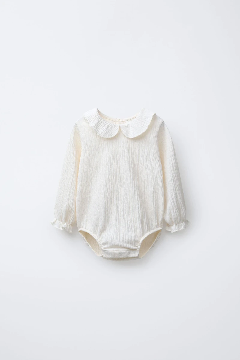TEXTURED NECK BODYSUIT