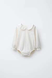 TEXTURED NECK BODYSUIT