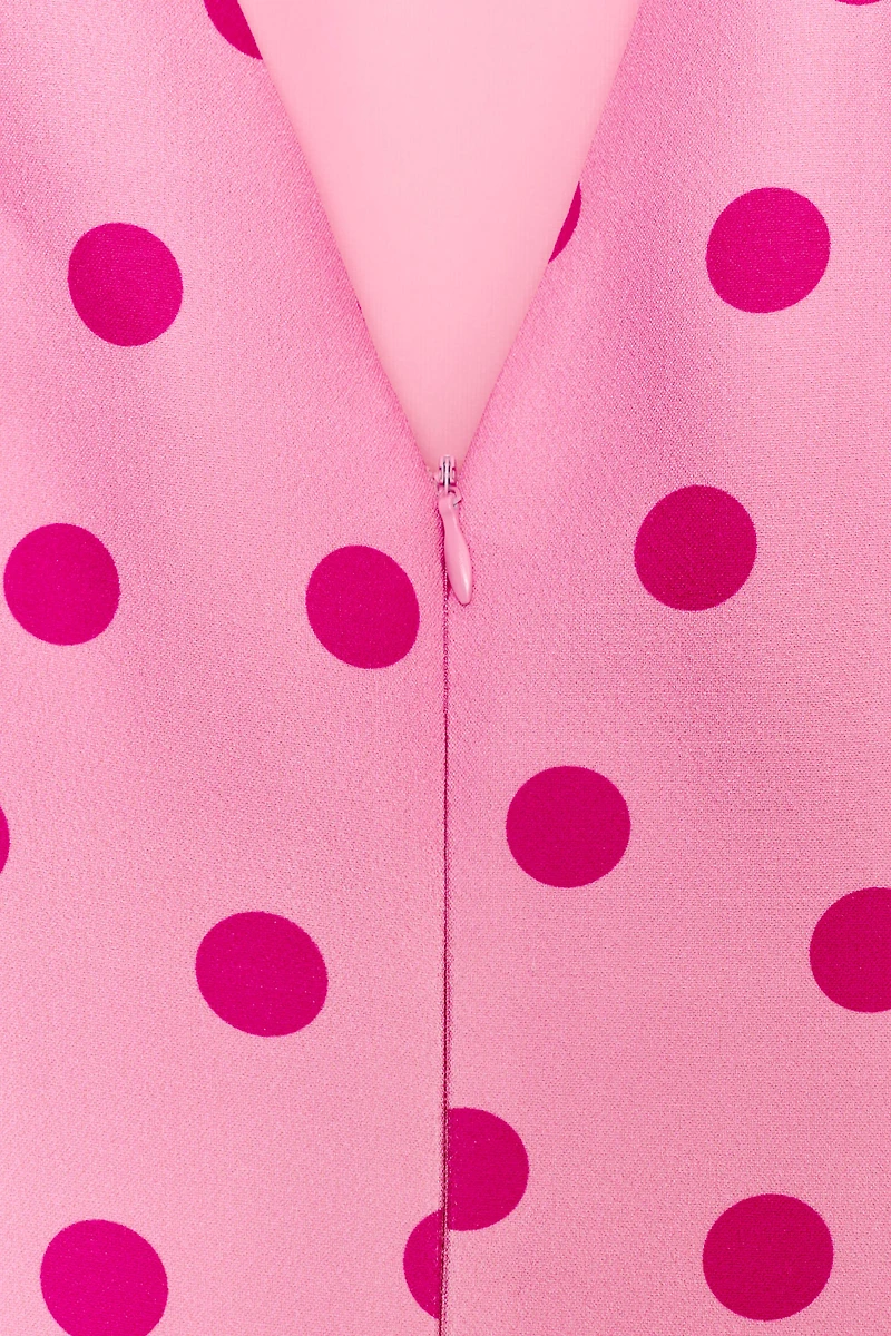 TOP À POIS ET MANCHES BOUFFANTES