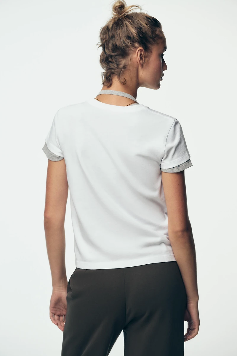 T-SHIRT DÉLAVÉ AVEC POCHE