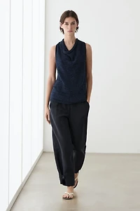 Flowing linen blend pants with buttoned tab detail