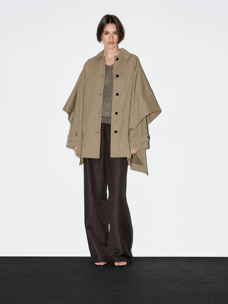 Cape trench coat with long sleeves