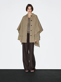 Cape trench coat with long sleeves