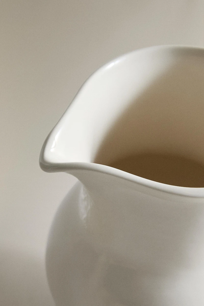 CREAM DECORATIVE CERAMIC PITCHER