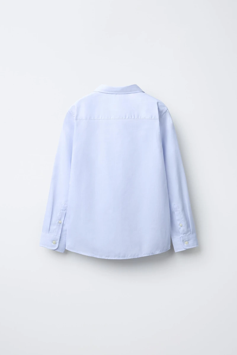 CHEMISE STRUCTURÉE UNIE HABILLÉE