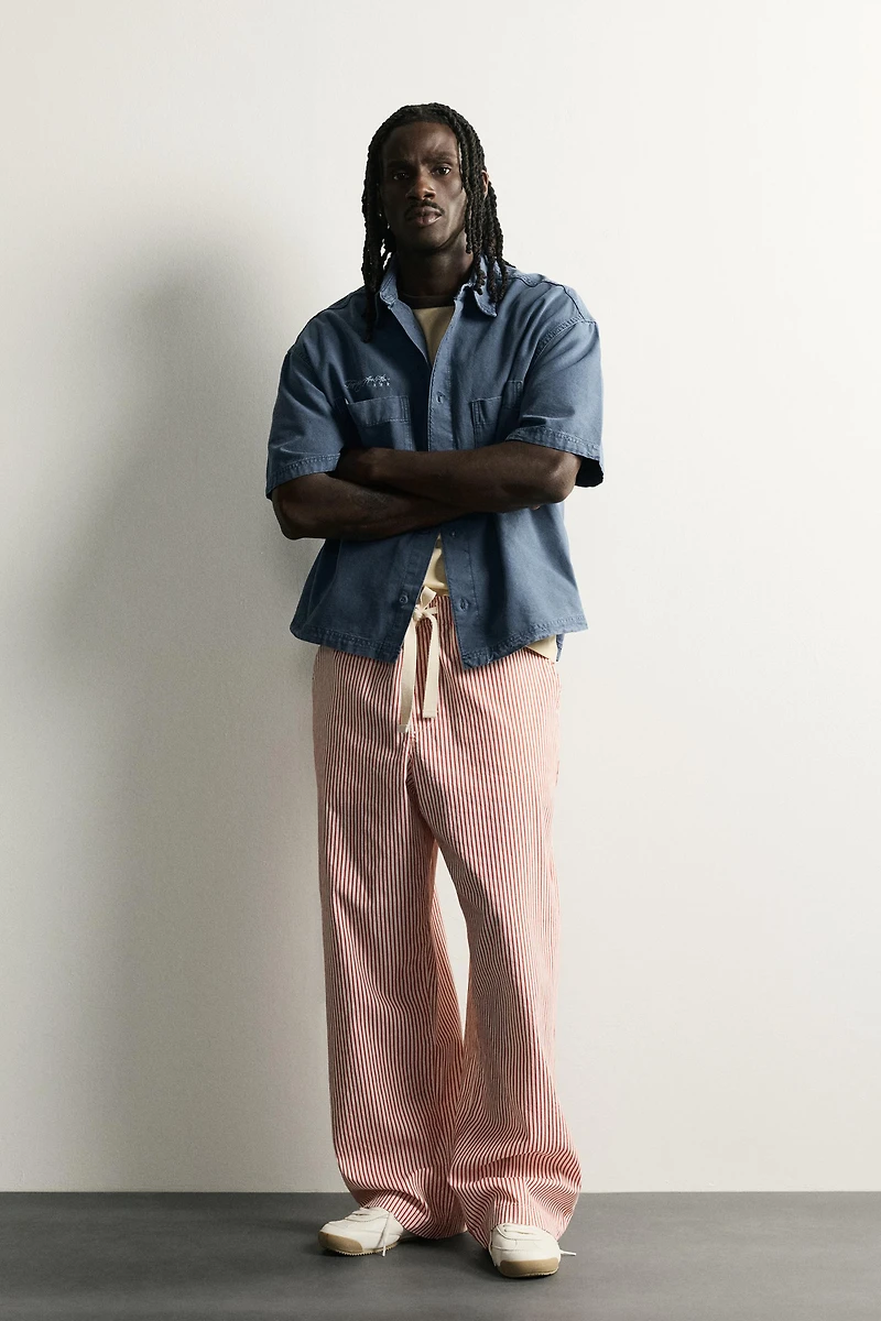 STRIPED BAGGY FIT PANTS