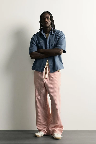 STRIPED BAGGY FIT PANTS