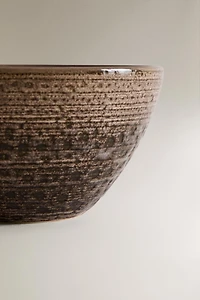 EARTHENWARE BOWL WITH RAISED DESIGN