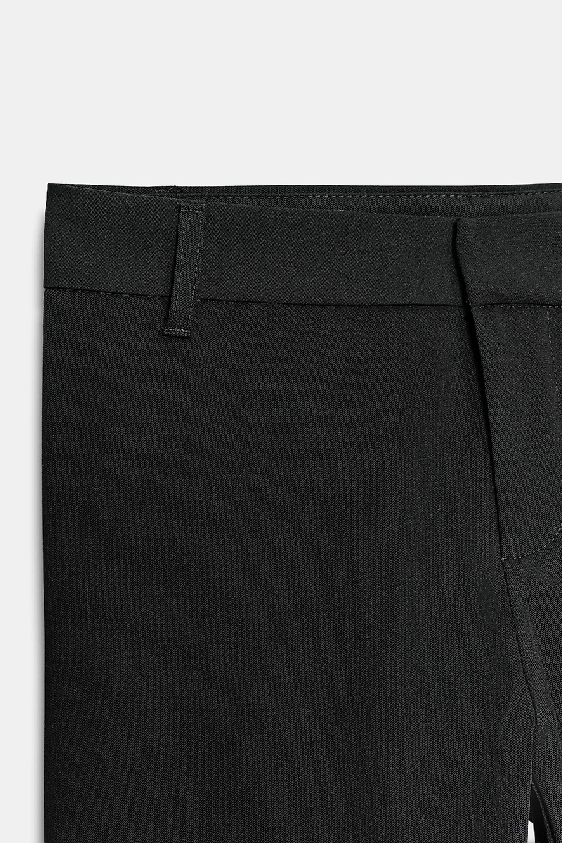 PANTALON FLARE À PASSANTS
