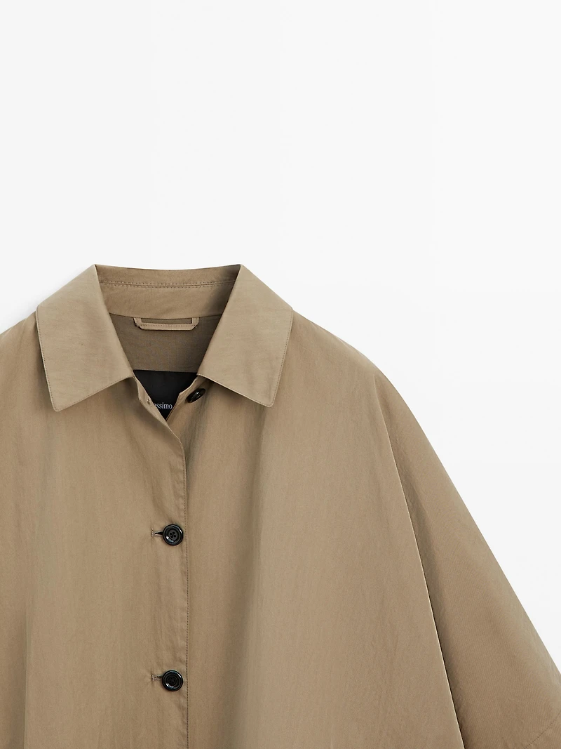Cape trench coat with long sleeves
