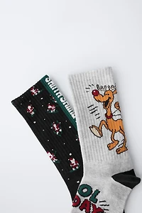 TWO-PACK OF SANTA CLAUS AND REINDEER LONG SOCKS