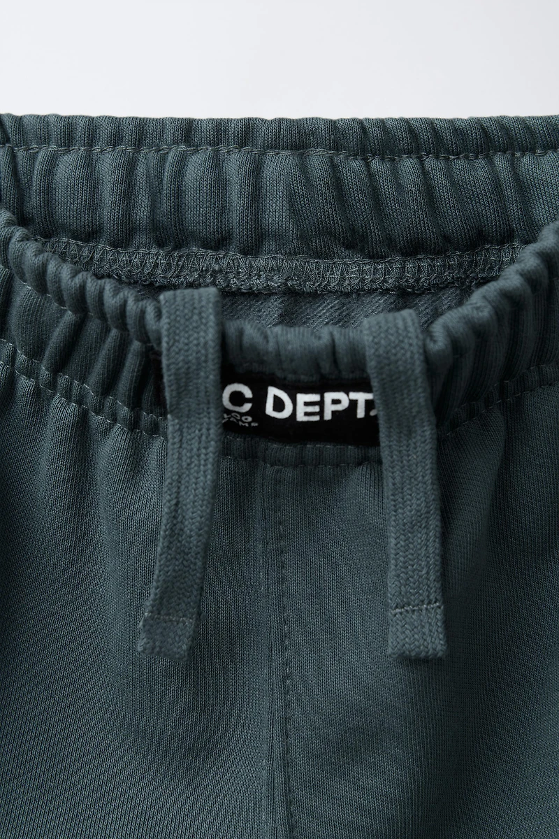 PANTALON EN MOLLETON AVEC ÉTIQUETTE