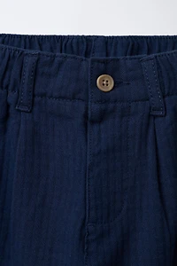 TEXTURED PANTS WITH LABEL