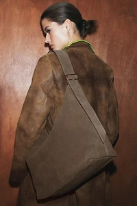 MAXI LEATHER BUCKET BAG WITH RING DETAIL