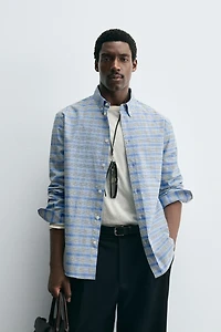 CHEMISE À CARREAUX COL BOUTONNÉ