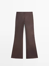 Waxed flare fit trousers