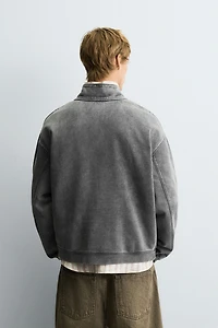 WASHED QUARTER-ZIP SWEATSHIRT