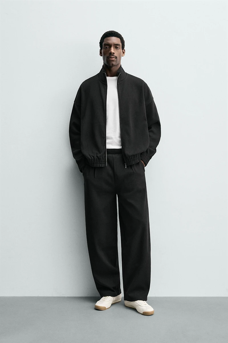 PLEATED WIDE FIT JOGGER PANTS