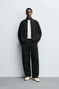PLEATED WIDE FIT JOGGER PANTS