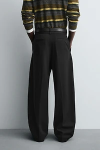 BALLOON FIT PLEATED BELTED PANTS