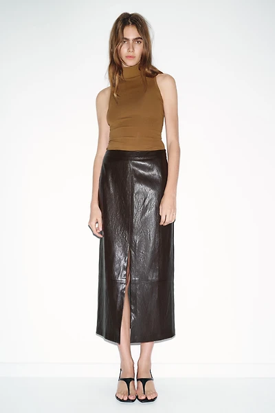 HIGH COLLAR SLEEVELESS TOP