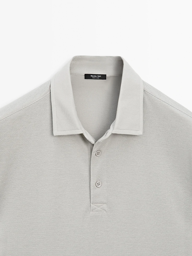 Textured short sleeve polo shirt