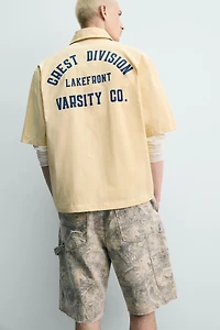 PRINTED TEXT BOXY FIT SHIRT