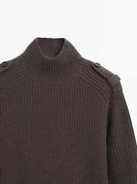 Knit sweater with shoulder detail