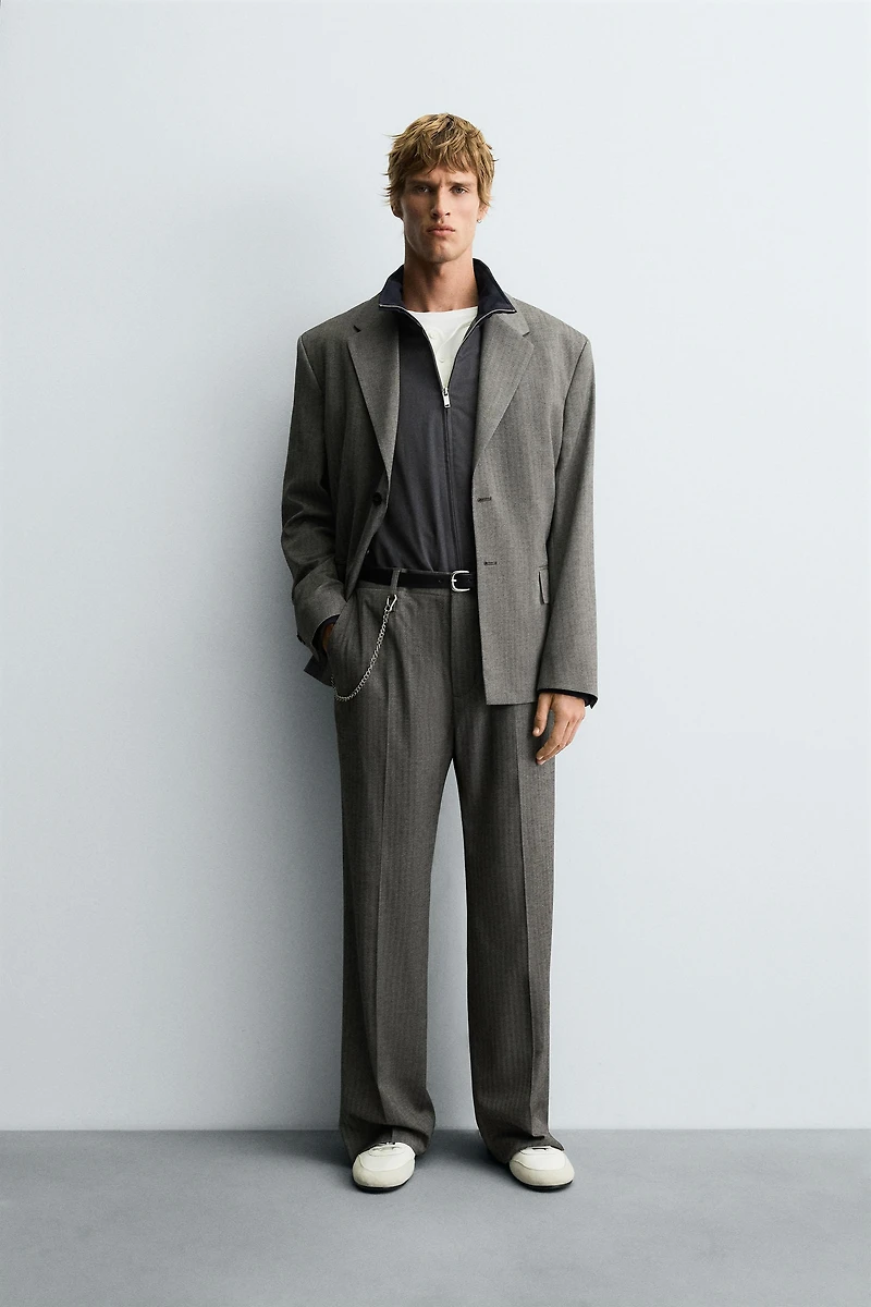 HERRINGBONE SUIT FLARE FIT PANTS