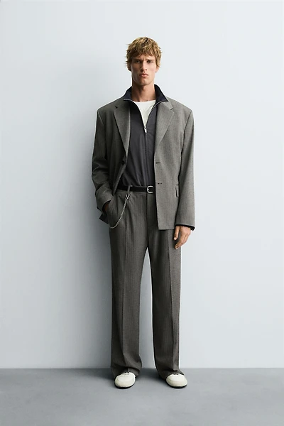 HERRINGBONE SUIT FLARE FIT PANTS