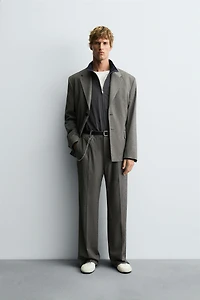 HERRINGBONE SUIT FLARE FIT PANTS