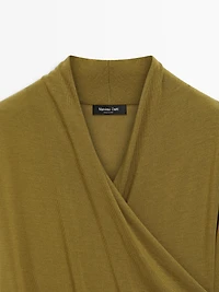 Draped top with surplice neckline
