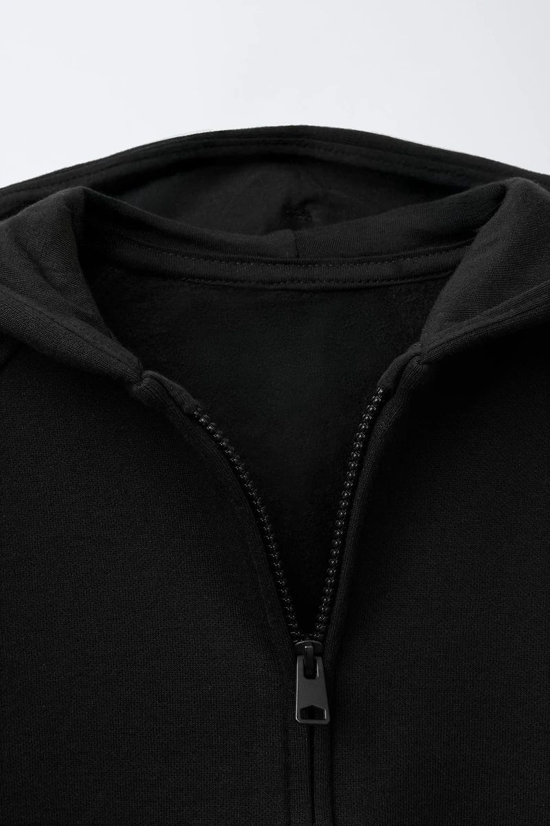 PLUSH ZIPPERED SWEATSHIRT