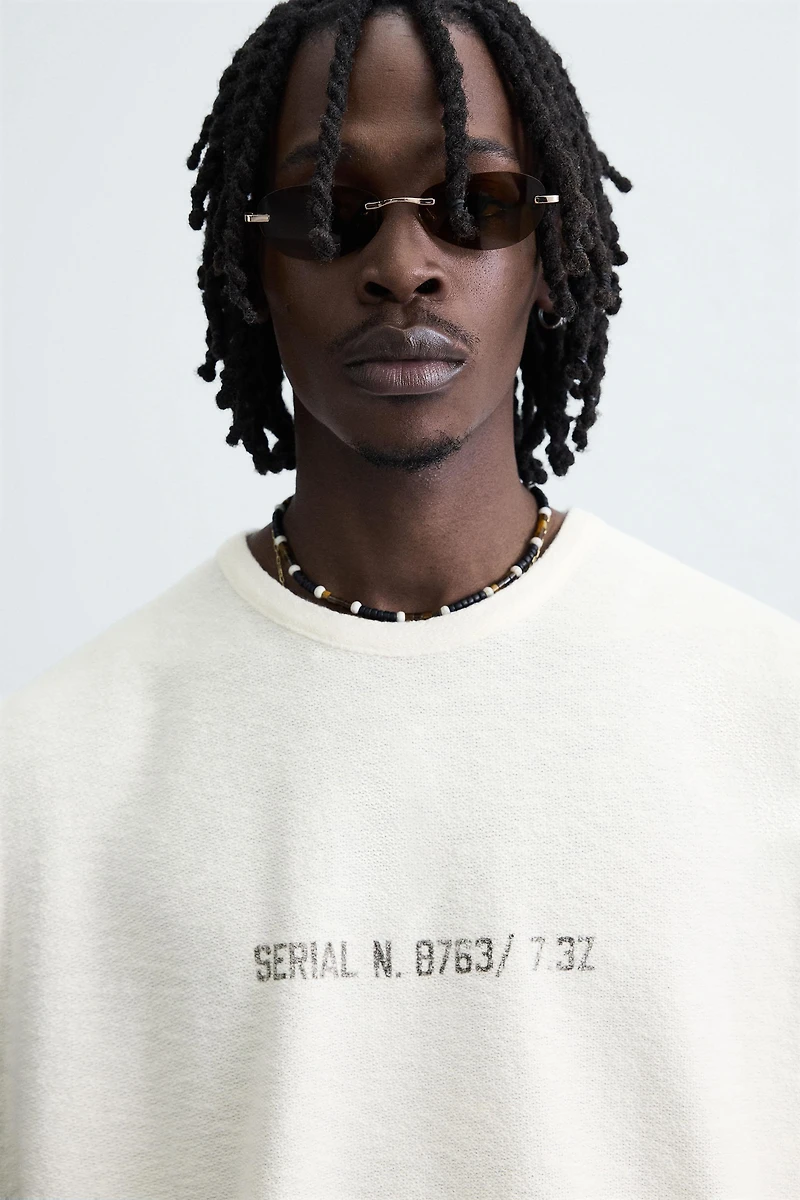 T-SHIRT TANK EN MAILLE IMPRIMÉ DÉLAVÉ