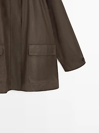 Parka longue détail poches
