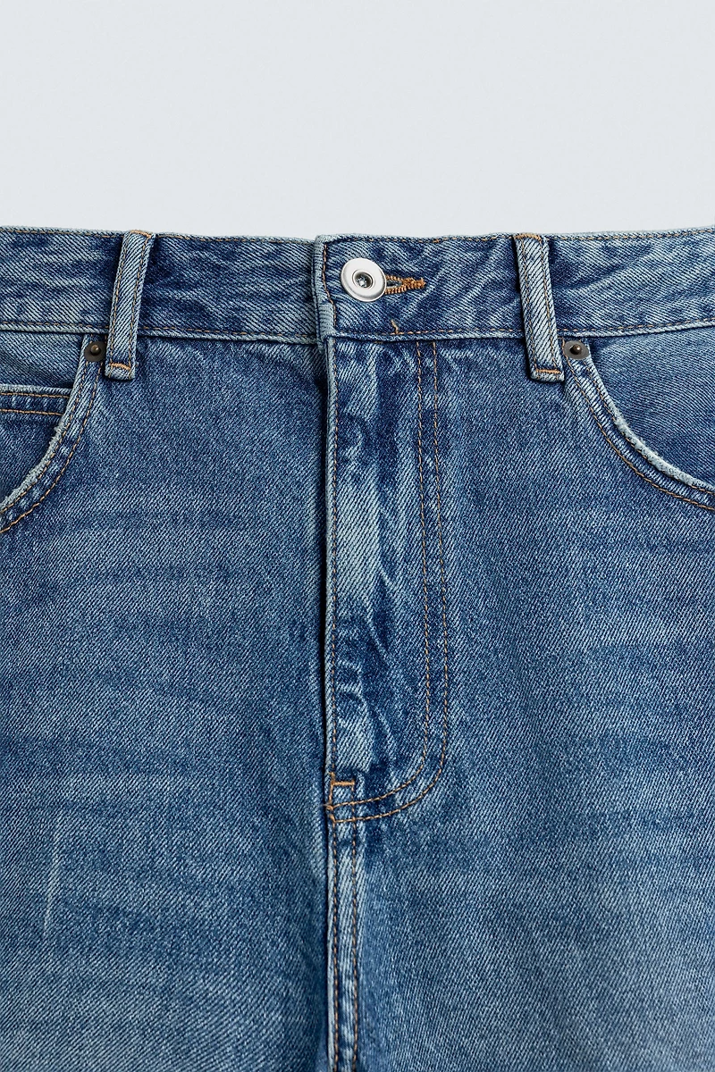 RELAXED FIT RIPPED JEANS
