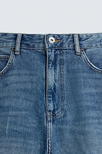 RELAXED FIT RIPPED JEANS
