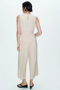 GOLD APPLIQUÉ JUMPSUIT