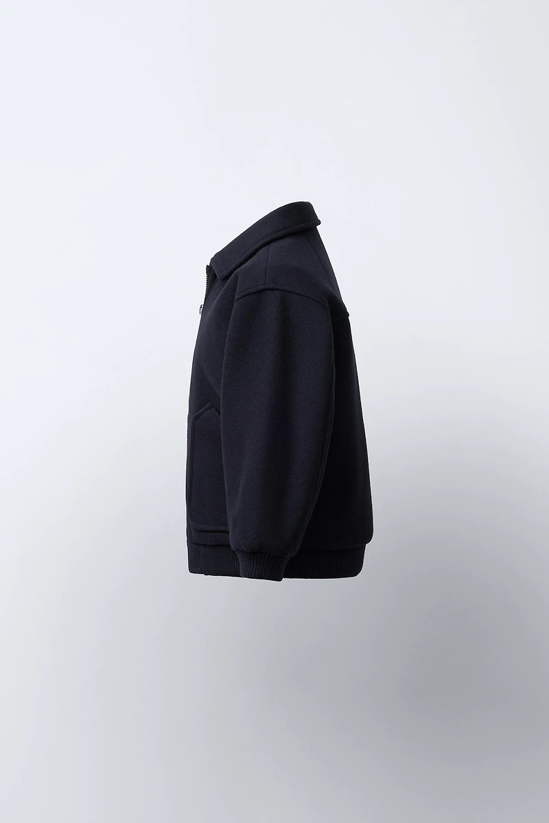 VESTE EN LAINE À POCHES