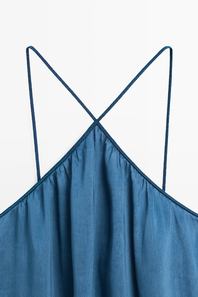 Long flowing dress with criss-cross straps