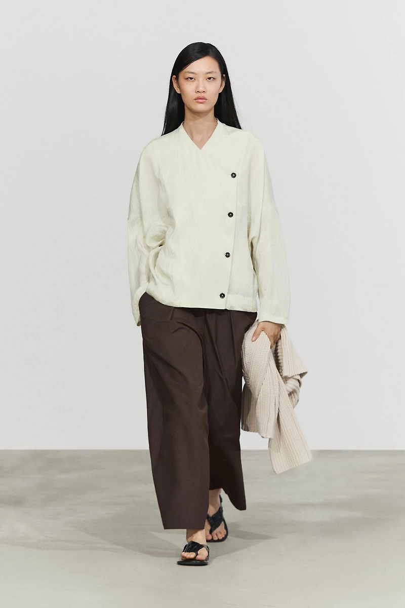Fluid wrap shirt with button detail