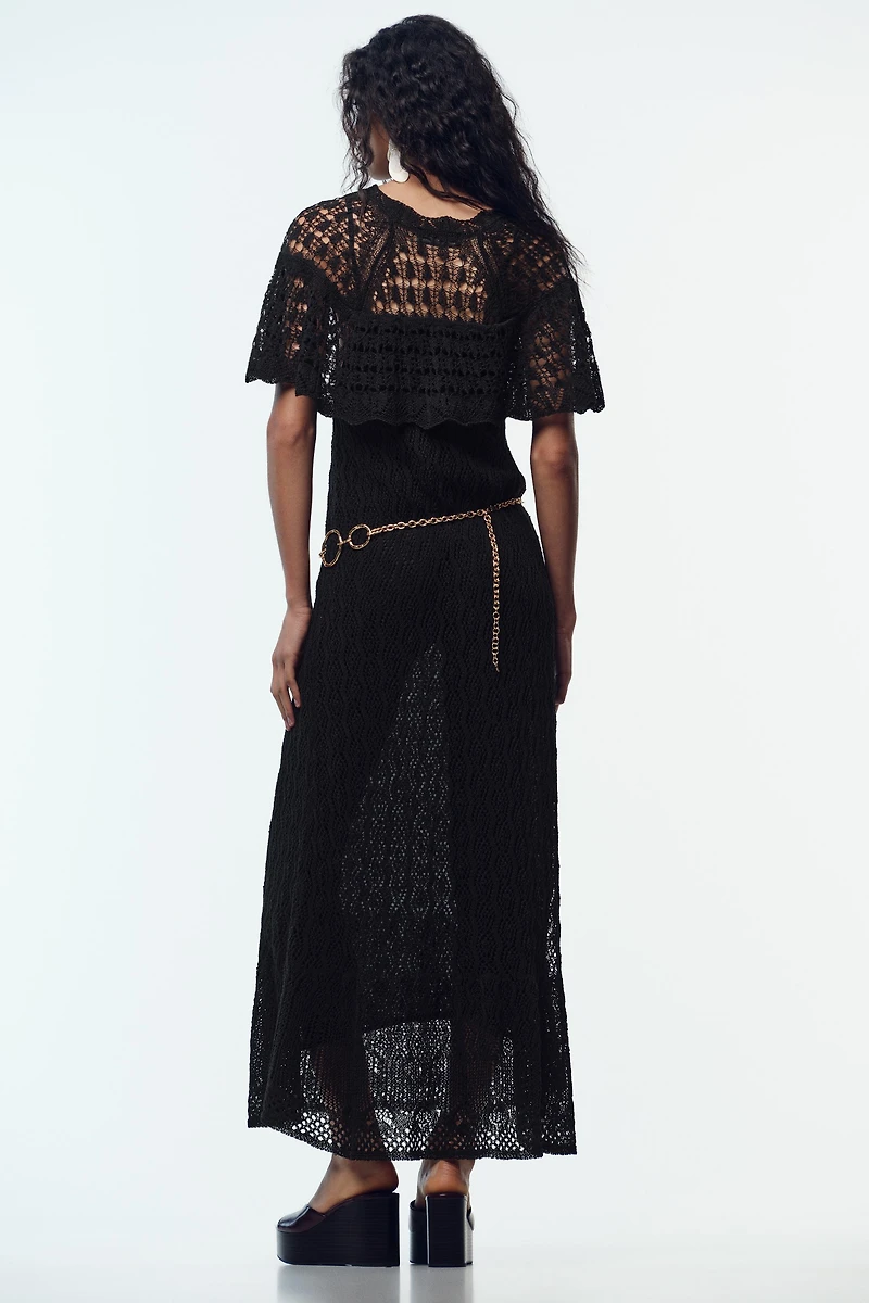 ROBE LONGUE EN MAILLE POINTELLE À VOLANT