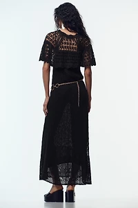 ROBE LONGUE EN MAILLE POINTELLE À VOLANT