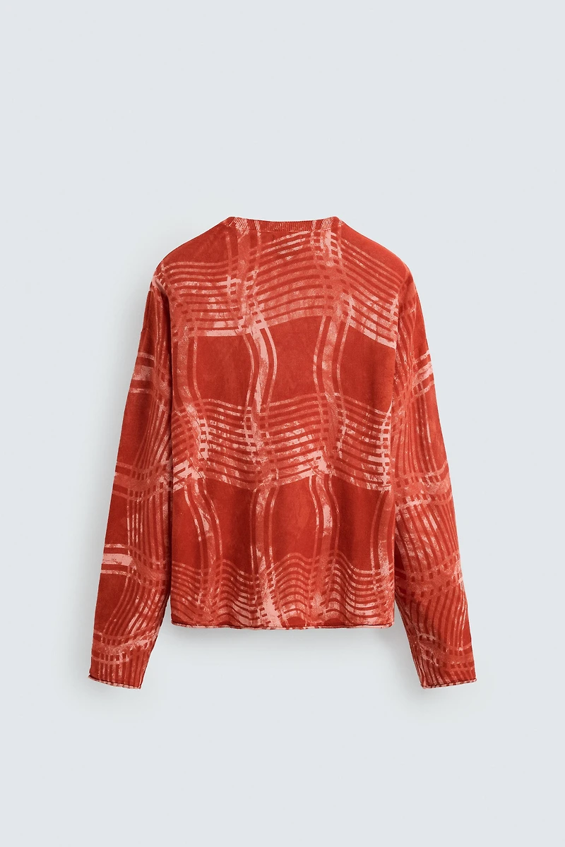 GRAPHIC PRINT SWEATER © OTIS KWAME KYE QUAICOE