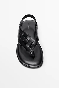 Flat woven leather sandals